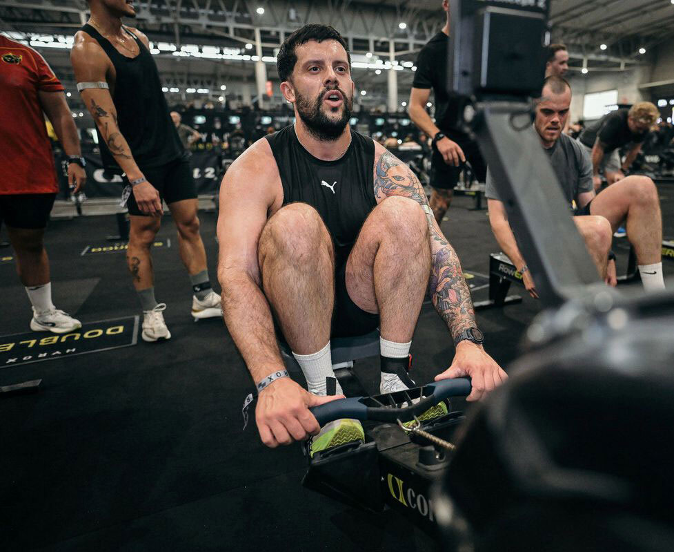 The coach is excercising.